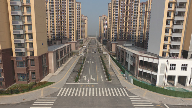 新东站安置三区配套市政道路新葡的京集团